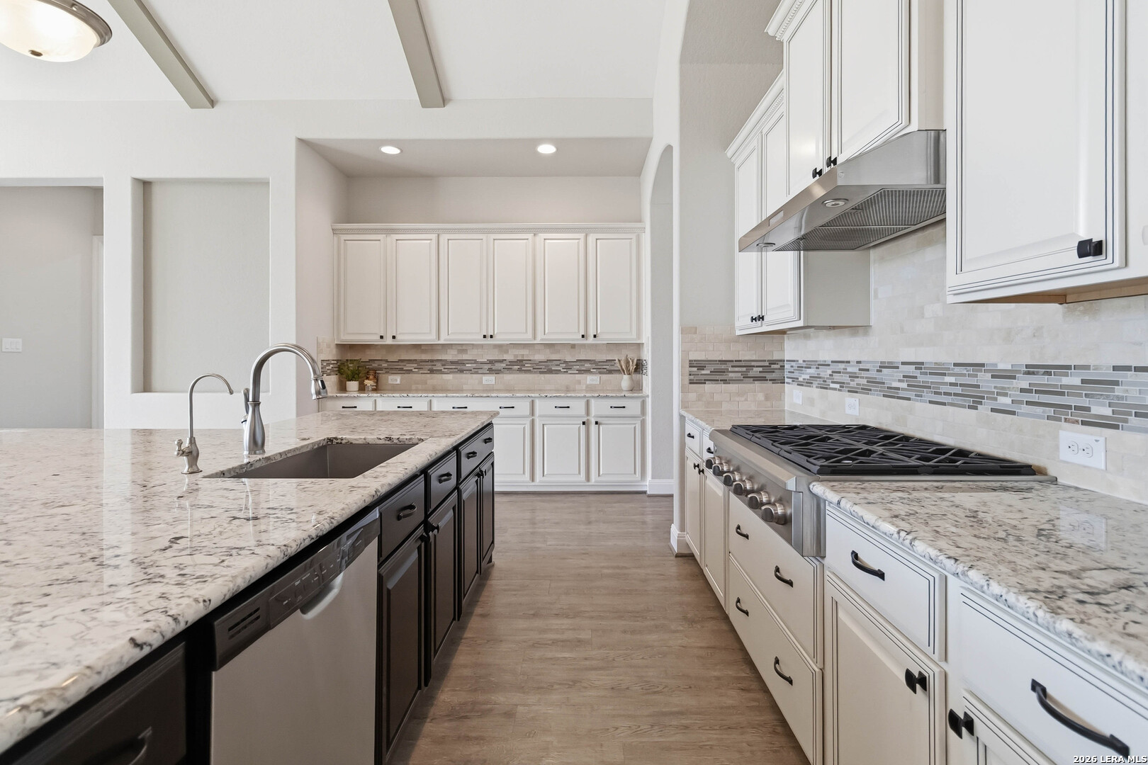 3337 Harvest View Marion, TX 78124 - Photo 7 of 39 a kitchen with granite countertop a sink stove and cabinets