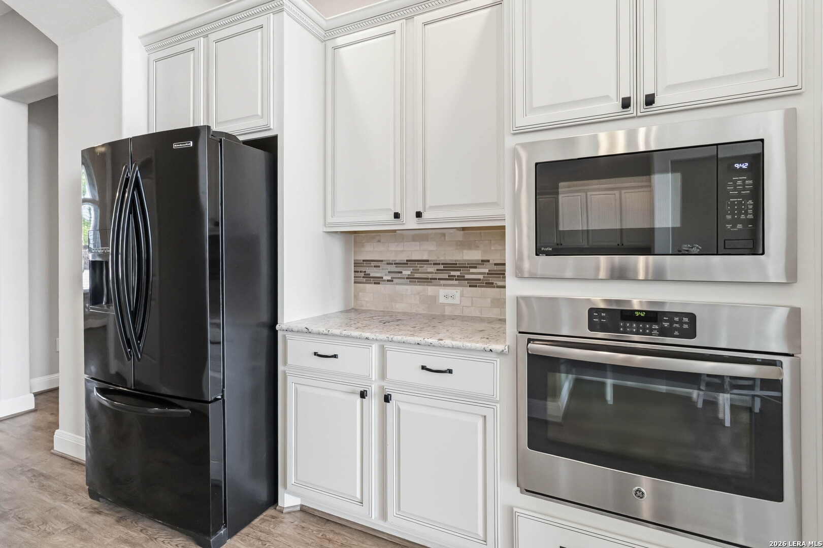 3337 Harvest View Marion, TX 78124 - Photo 8 of 39 a kitchen with cabinets and stainless steel appliances