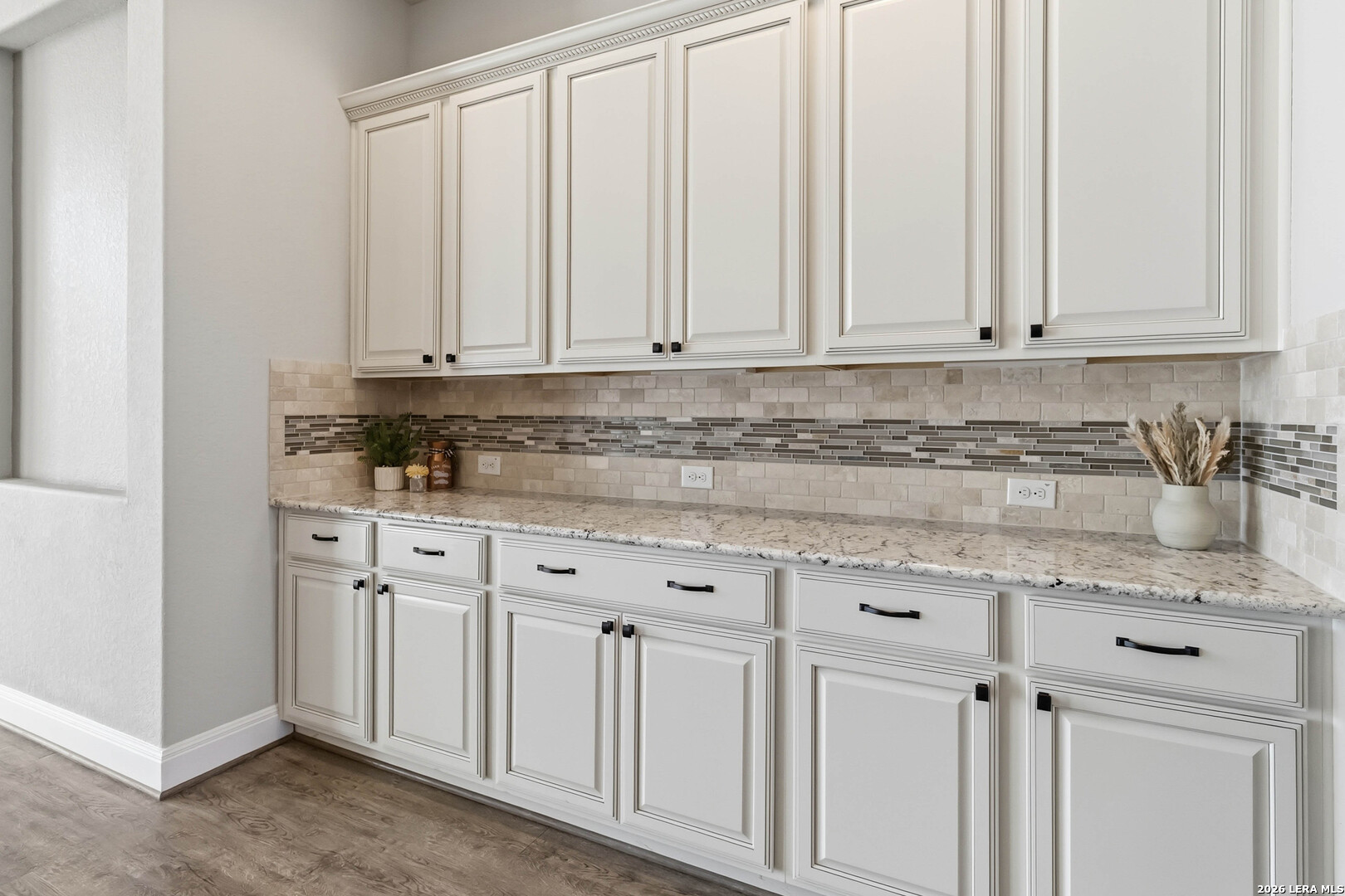 3337 Harvest View Marion, TX 78124 - Photo 9 of 39 a kitchen with granite countertop white cabinets and sink