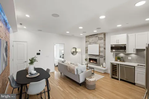 a living room with furniture and a table