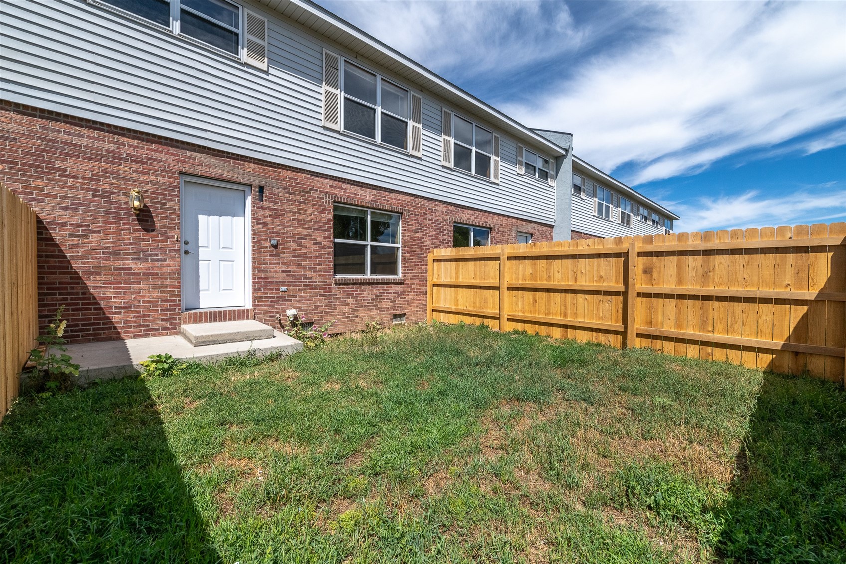409 South 3rd Street, Unit 409 Hayden, CO 81639 - Photo 5 of 23 a backyard of a house with lots of green space