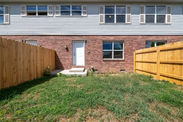a house view with a backyard space