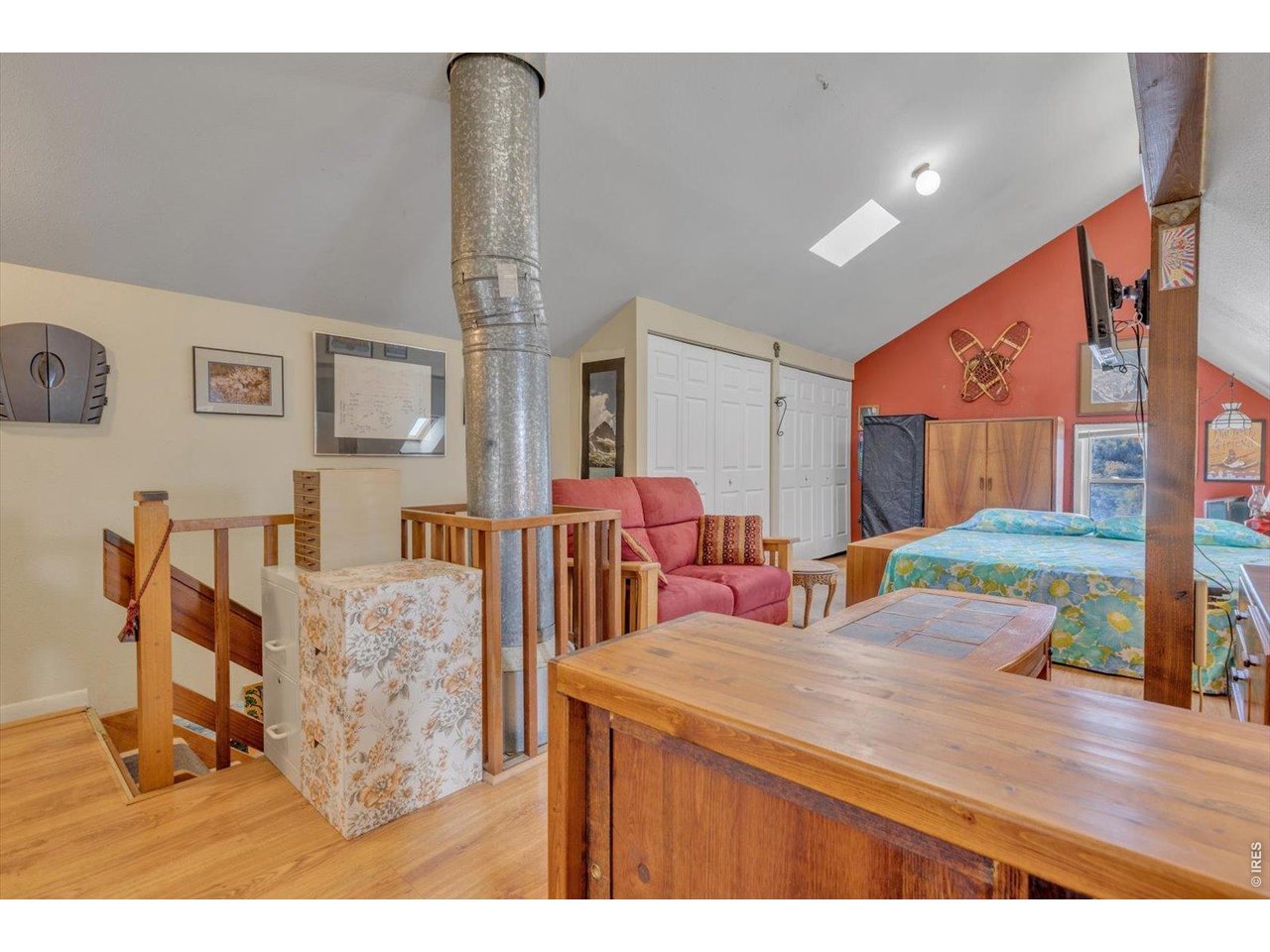 496 Escape Route Boulder, CO 80302 - Photo 10 of 21 a view of a dining room with furniture and wooden floor