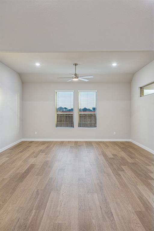 1404 Companero Street Haslet, TX 76052 - Photo 16 of 40 Living Room in the Wimbledon home plan by Trophy Signature Homes – REPRESENTATIVE PHOTO
