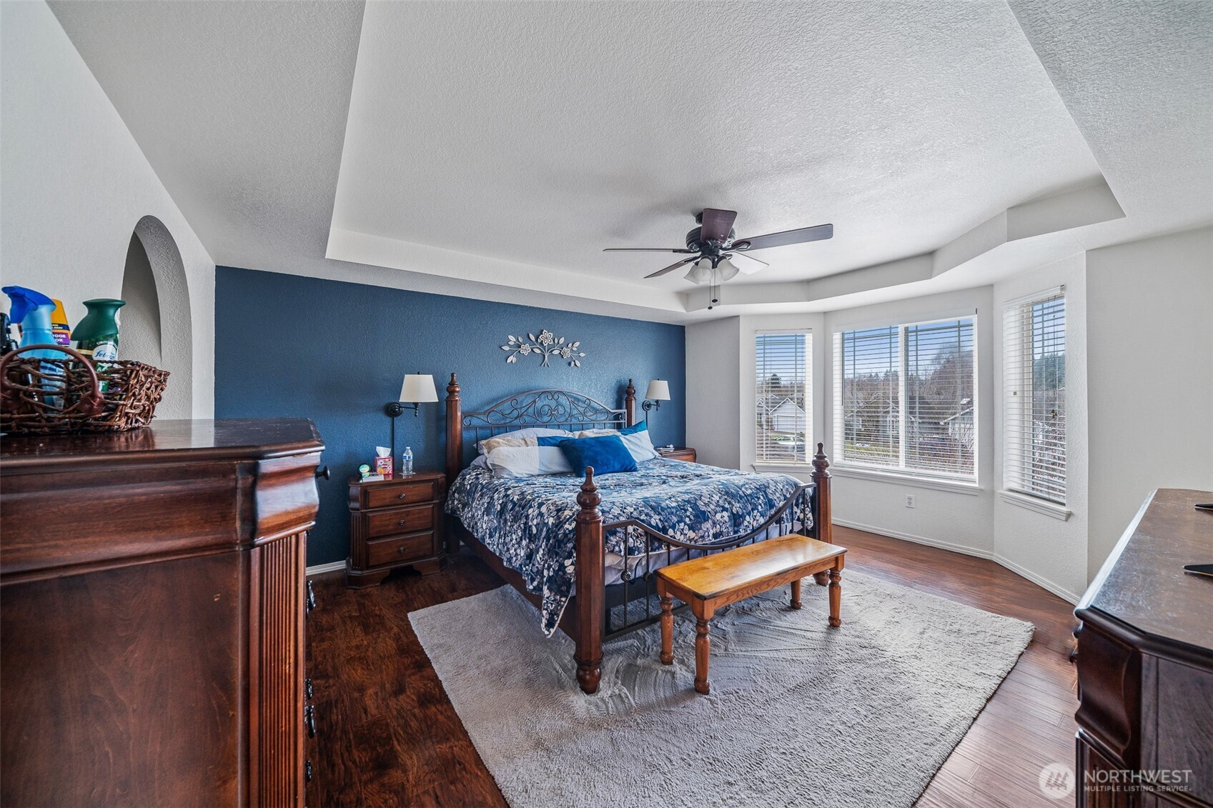 5513 Park Pl Loop Southeast Lacey, WA 98503 - Photo 17 of 33 a bedroom with a bed and wooden floor