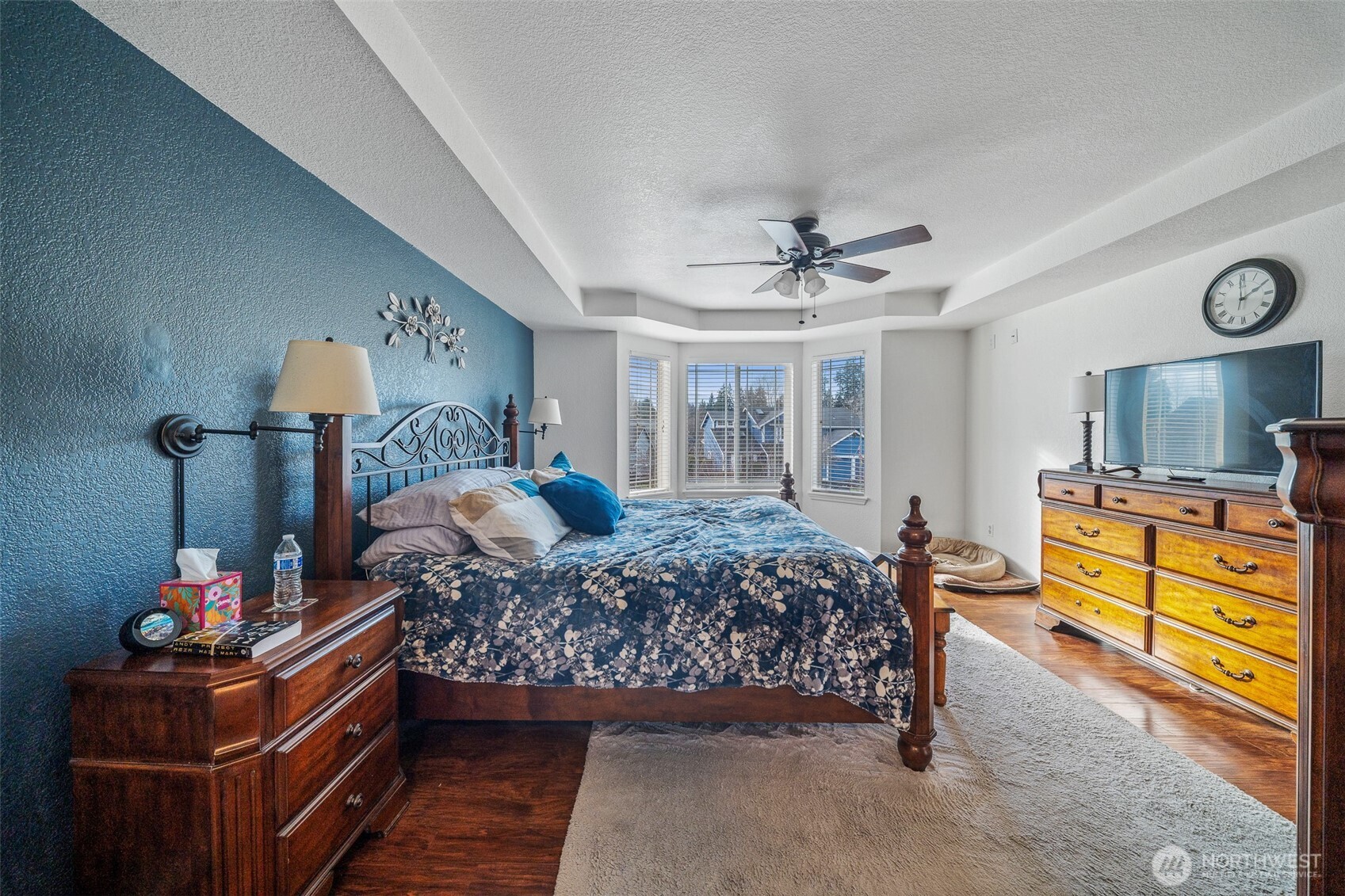 5513 Park Pl Loop Southeast Lacey, WA 98503 - Photo 18 of 33 a bed room with a bed and a chandelier