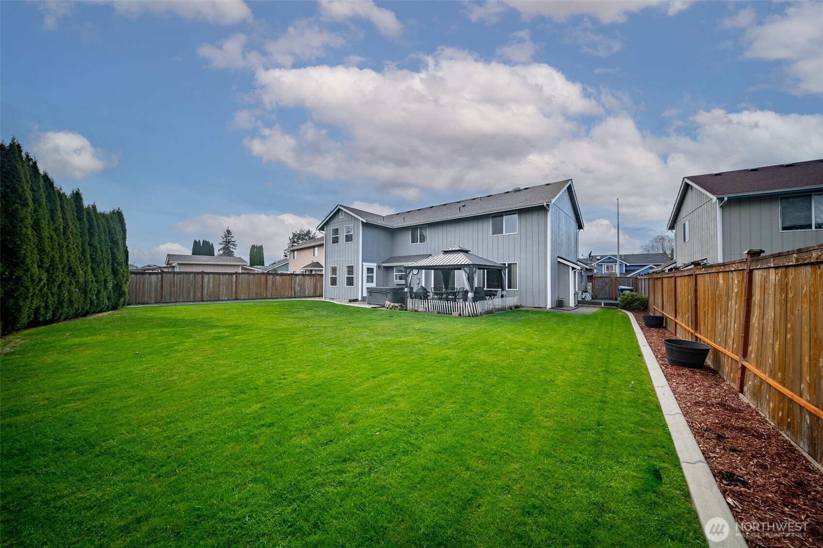 5513 Park Pl Loop Southeast Lacey, WA 98503 - Photo 28 of 33 a view of a house with backyard and porch