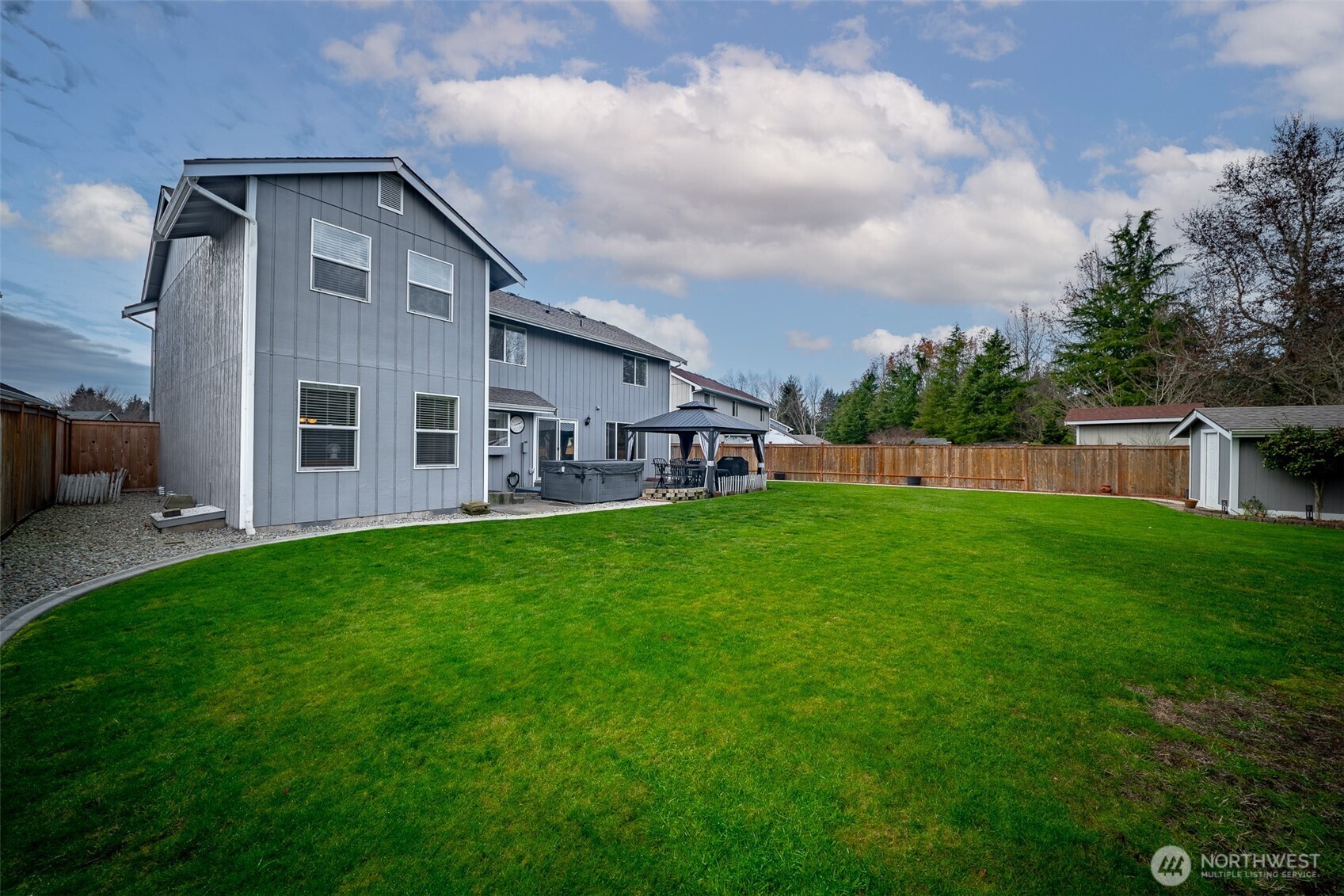 5513 Park Pl Loop Southeast Lacey, WA 98503 - Photo 29 of 33 a view of an house with backyard and garden