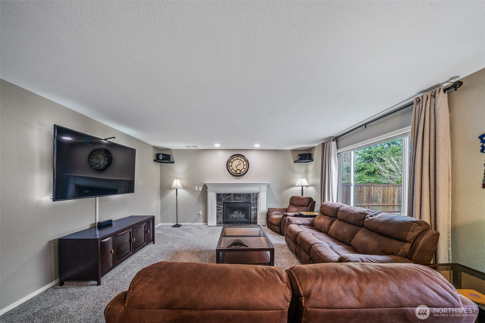 5513 Park Pl Loop Southeast Lacey, WA 98503 - Photo 9 of 33 a living room with furniture fireplace and window