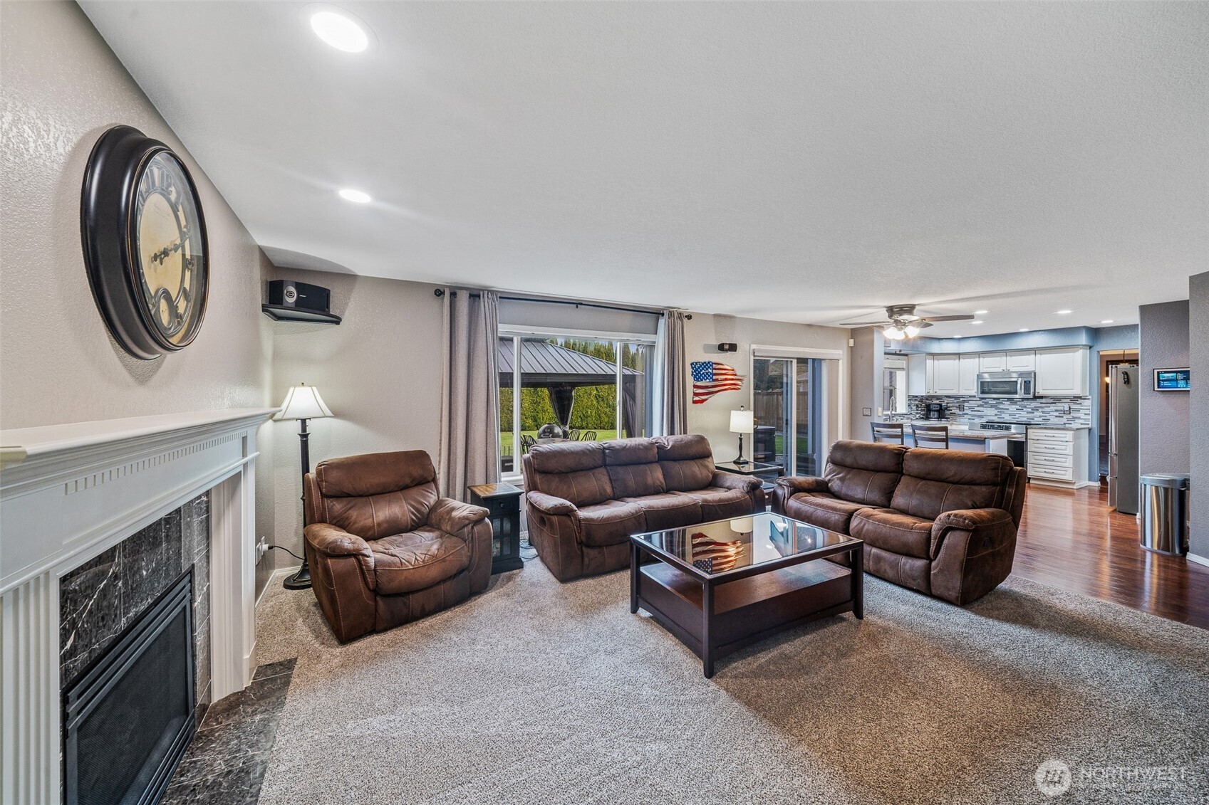 5513 Park Pl Loop Southeast Lacey, WA 98503 - Photo 10 of 33 a living room with furniture and a fireplace