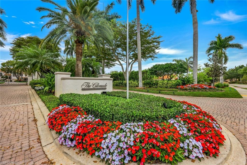 269 Colonade Circle, Unit 2802 Naples, FL 34103 - Photo 37 of 50 a building view with a garden