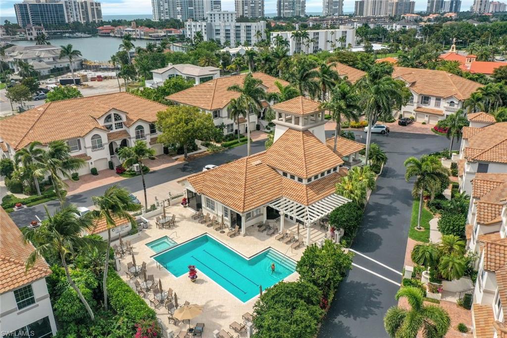 269 Colonade Circle, Unit 2802 Naples, FL 34103 - Photo 44 of 50 an aerial view of residential houses with outdoor space