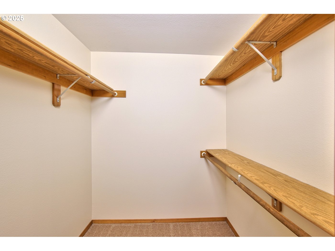 8411 Southwest 184th Loop Beaverton, OR 97007 - Photo 18 of 34 a view of a room with stairs and a ceiling fan