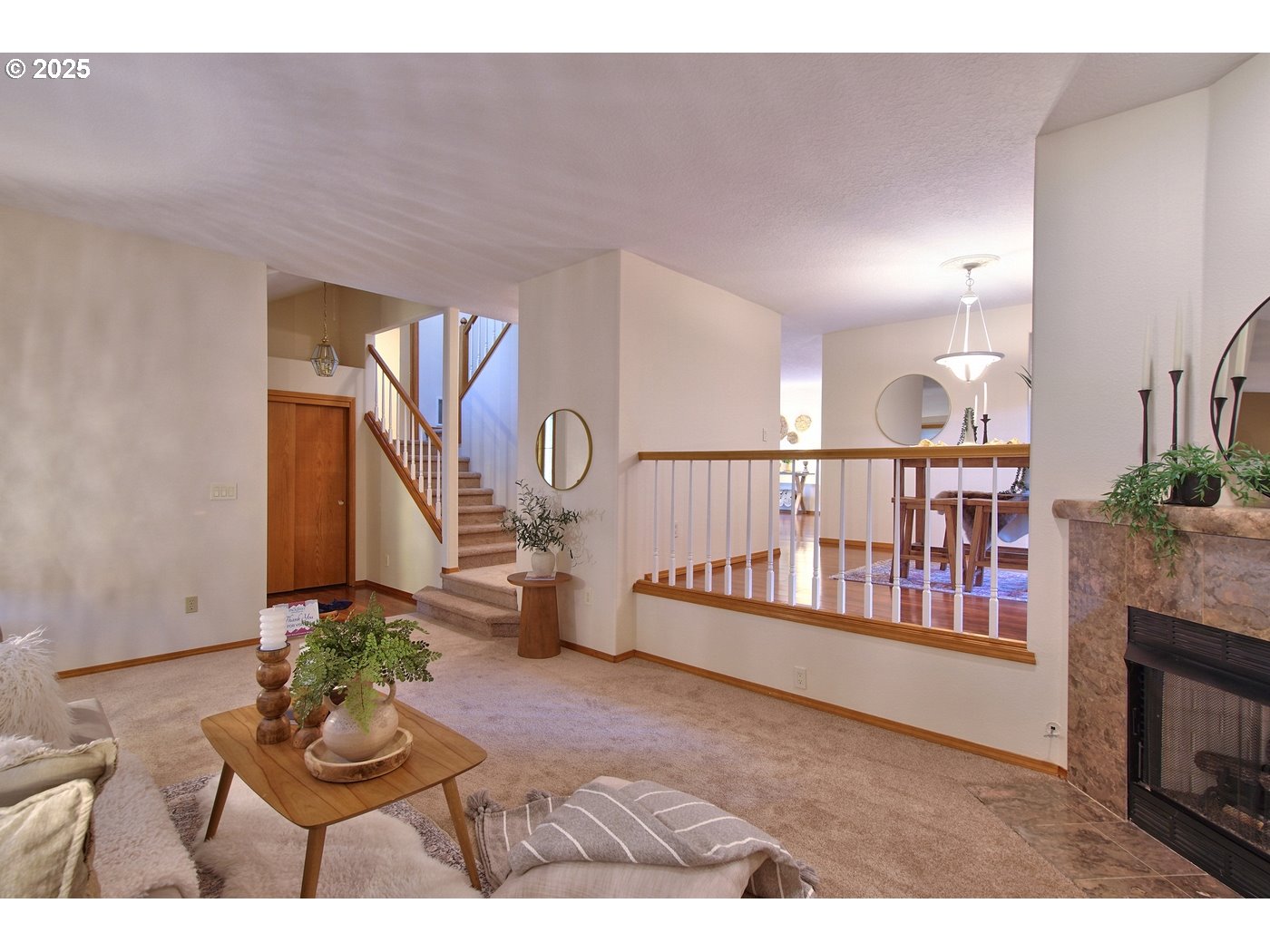 8411 Southwest 184th Loop Beaverton, OR 97007 - Photo 6 of 34 a view of entryway livingroom and hall with wooden floor