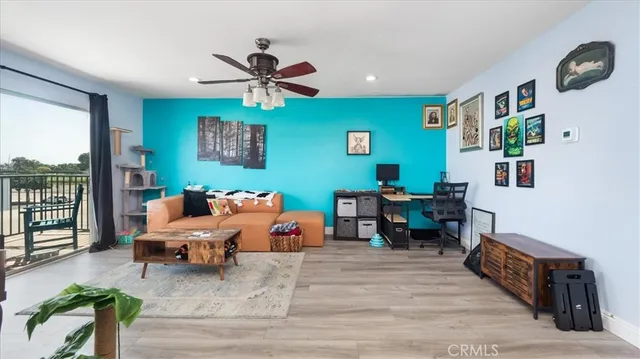 a bed room with furniture and a window