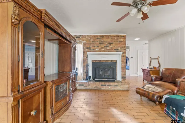 a view of a livingroom with furniture and a flat screen tv