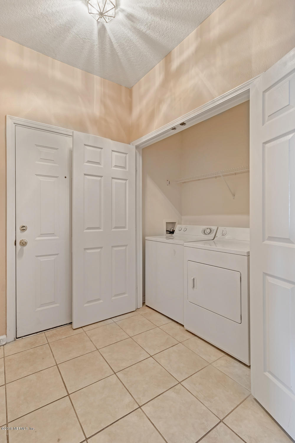 7990 Baymeadows Road East, Unit 211 Jacksonville, FL 32256 - Photo 5 of 21 a view of a storage & utility room