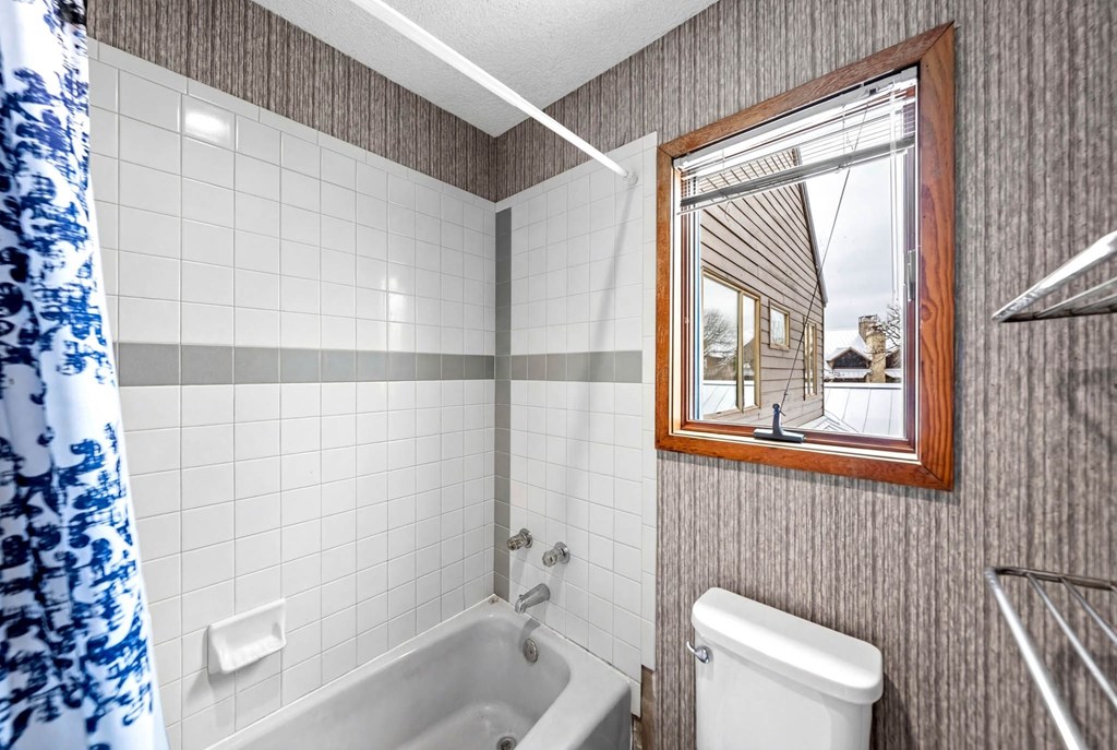 805-119 Highway 534 Loop Kerrville, TX 78028 - Photo 18 of 23 a bathroom with a toilet a sink and shower