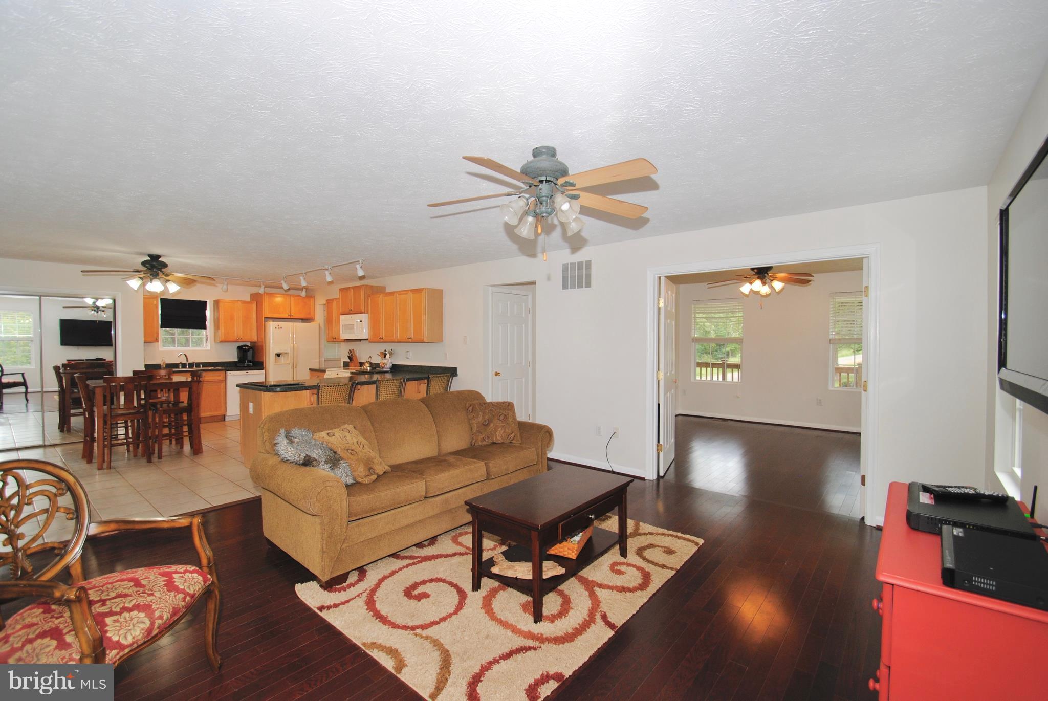 302 Fairhaven Road Tracys Landing, MD 20779 - Photo 6 of 24 a living room with furniture and wooden floor