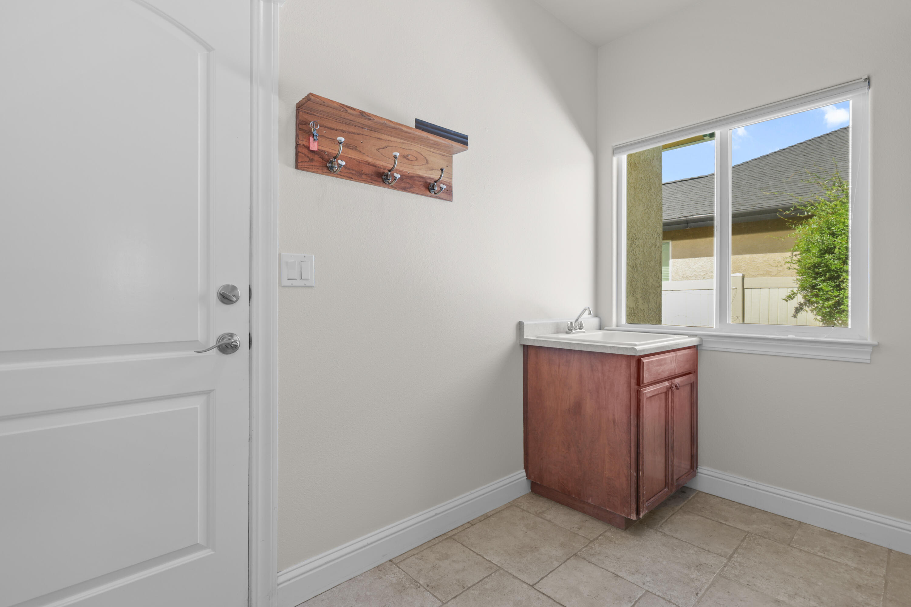 2110 Cadjew Street Redding, CA 96003 - Photo 37 of 62 a room with window and cabinet
