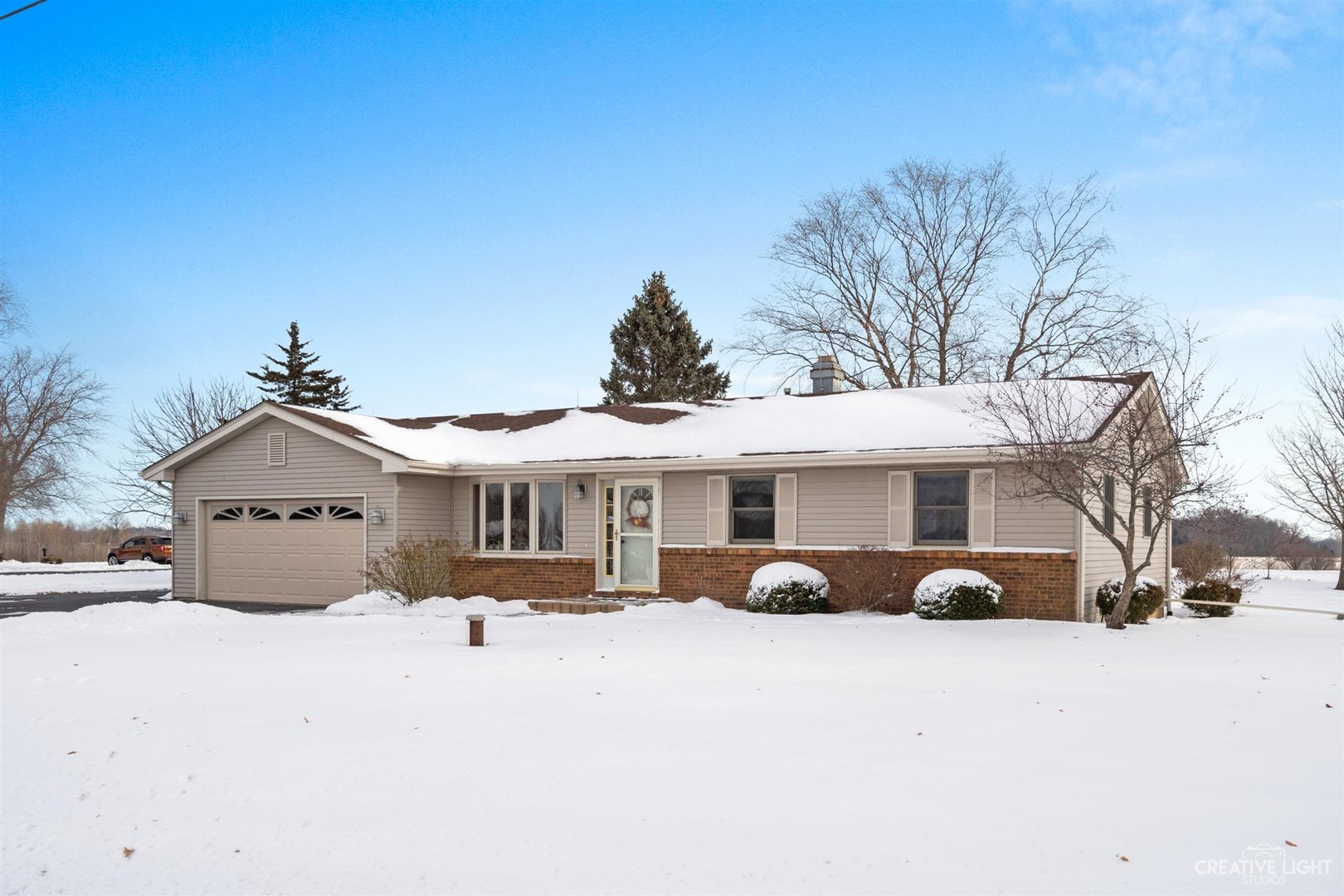 11N229 Muirhead Road Elgin, IL 60124 - Photo 3 of 37 a front view of a house with a yard
