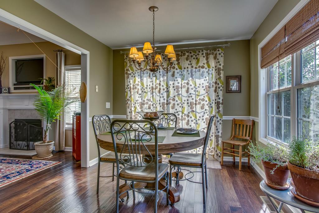 14082 Mt Pleasant Road Rockvale, TN 37153 - Photo 11 of 30 a view of a dining room with furniture window and wooden floor