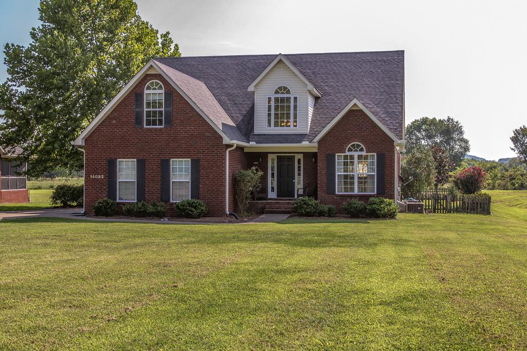 14082 Mt Pleasant Road Rockvale, TN 37153 - Photo 2 of 30 a front view of a house with a garden
