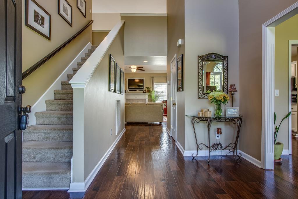 14082 Mt Pleasant Road Rockvale, TN 37153 - Photo 4 of 30 a view of a hallway with wooden floor stairs