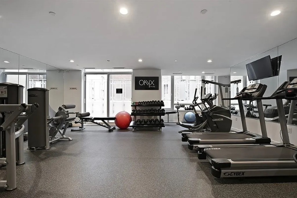 261 West 28th Street, Unit 10D Manhattan, NY 10001 - Photo 17 of 19 a view of a room with gym equipment