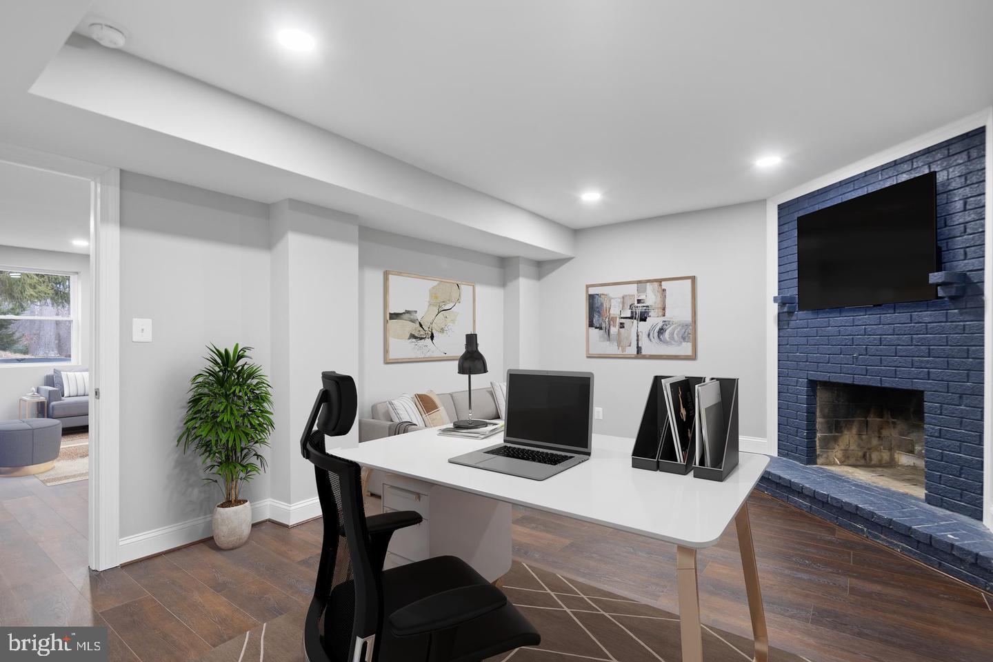 2683 Walston Road Mount Airy, MD 21771 - Photo 48 of 62 Modern workspace with cozy fireplace.