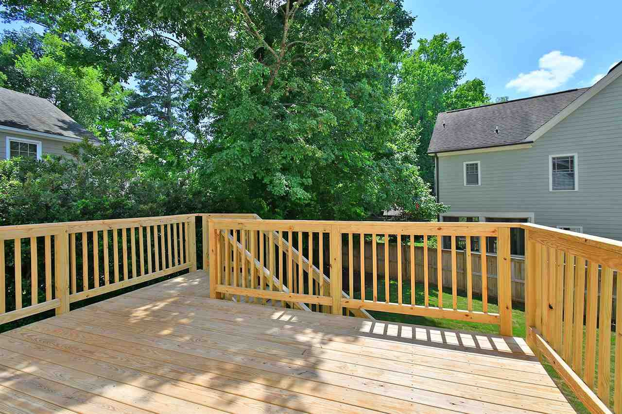 2017 Pine Drive Raleigh, NC 27608 - Photo 25 of 25 a view of a wooden roof deck
