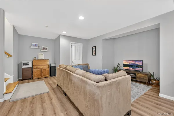 a living room with furniture and a couch