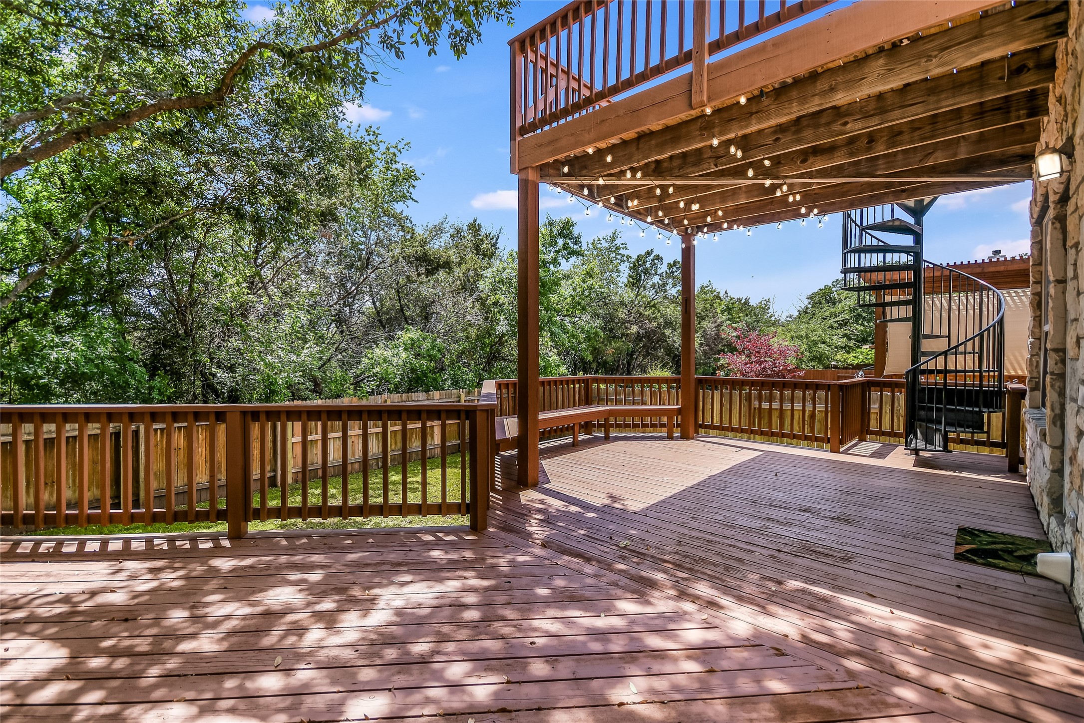 12935 Brigham Drive Austin, TX 78732 - Photo 31 of 35 Expansive Backyard Decks make entertaining a breeze.