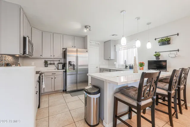 a view of entryway with wooden floor and stairs