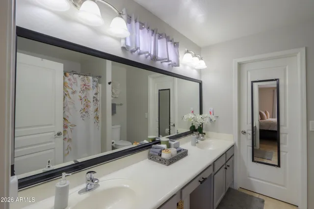 a view of a chair and table in the garden