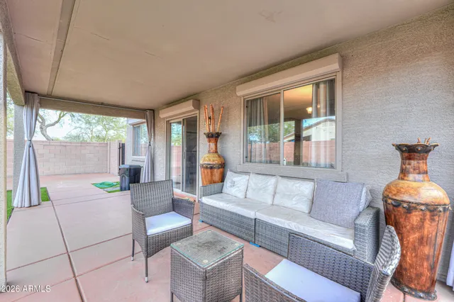 a view of a house with outdoor space and porch