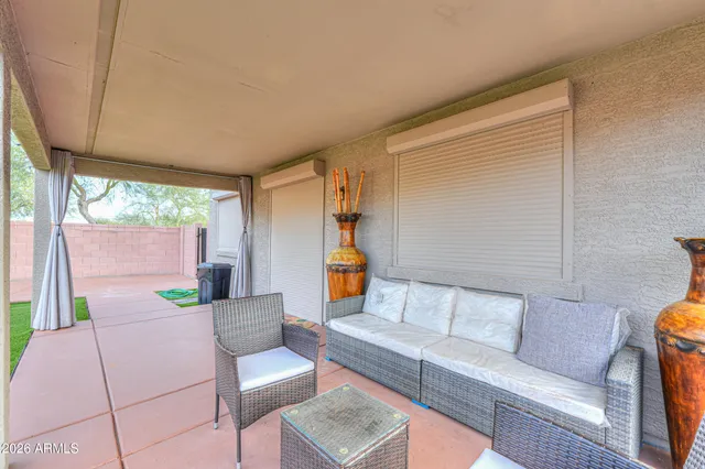 a spacious bedroom with a bed and a table