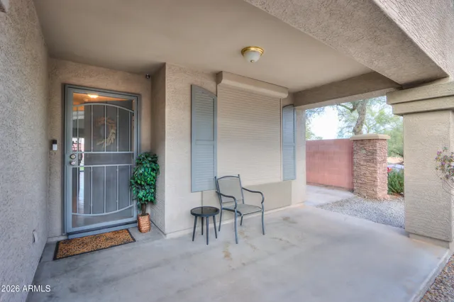 a view of a hallway with a dining area
