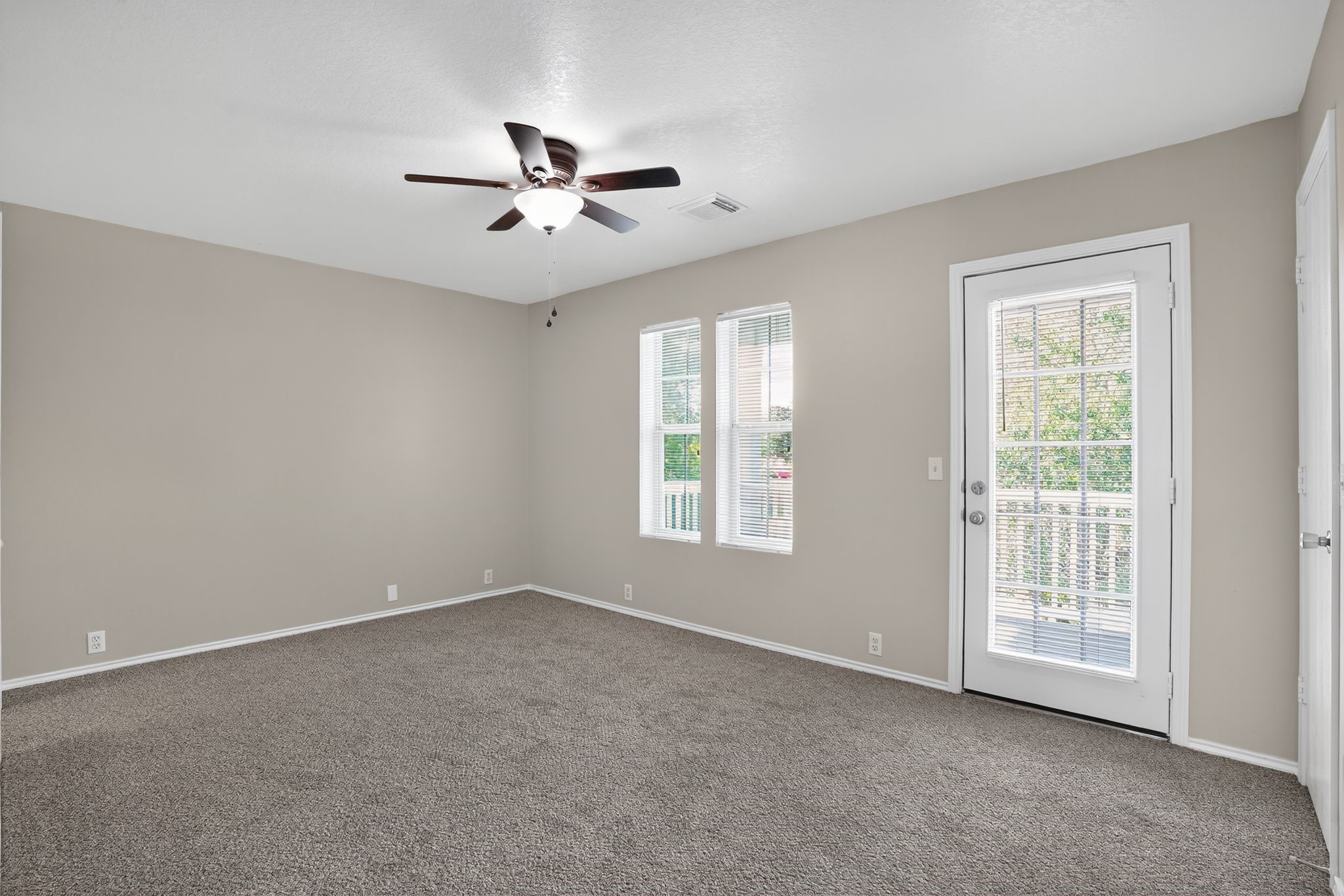 2814 Legends Crest Drive Spring, TX 77386 - Photo 20 of 34 large bedroom #1 with balcony and walk in closet with ensuite bathroom