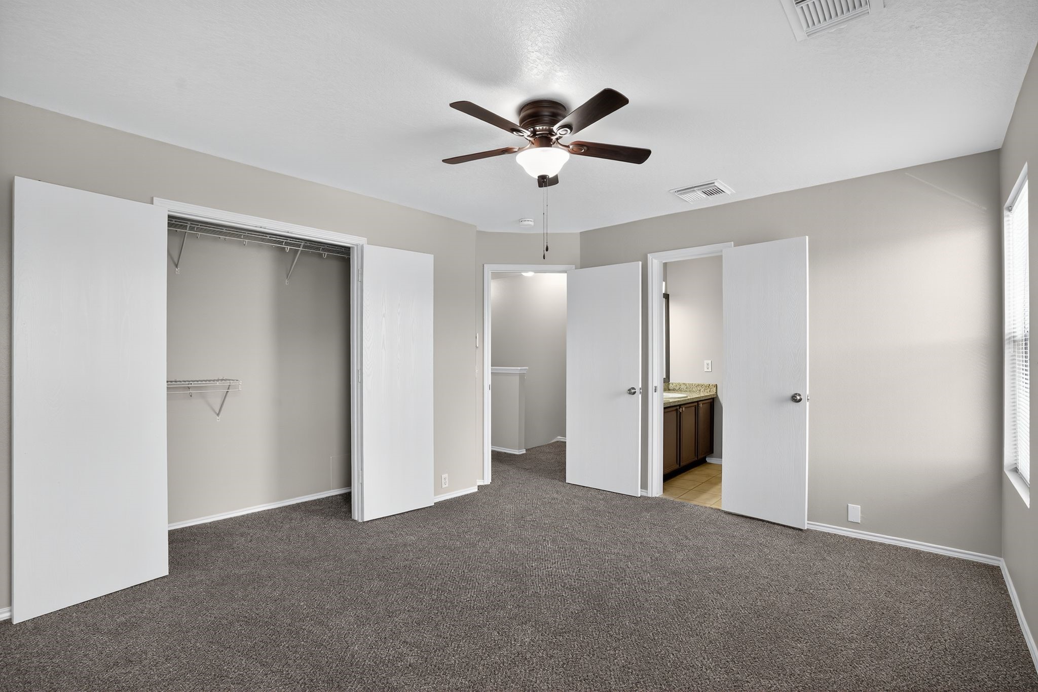 2814 Legends Crest Drive Spring, TX 77386 - Photo 23 of 34 Bedroom #2 showing closet and ensuite bath