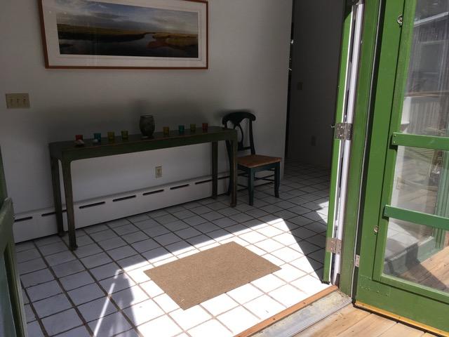 1080 Browns Neck Road Wellfleet, MA 02667 - Photo 7 of 35 a view of wooden floor and chairs in a room