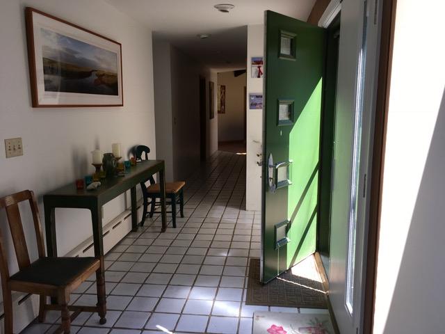 1080 Browns Neck Road Wellfleet, MA 02667 - Photo 8 of 35 a view of a hallway with wooden floor and stairs