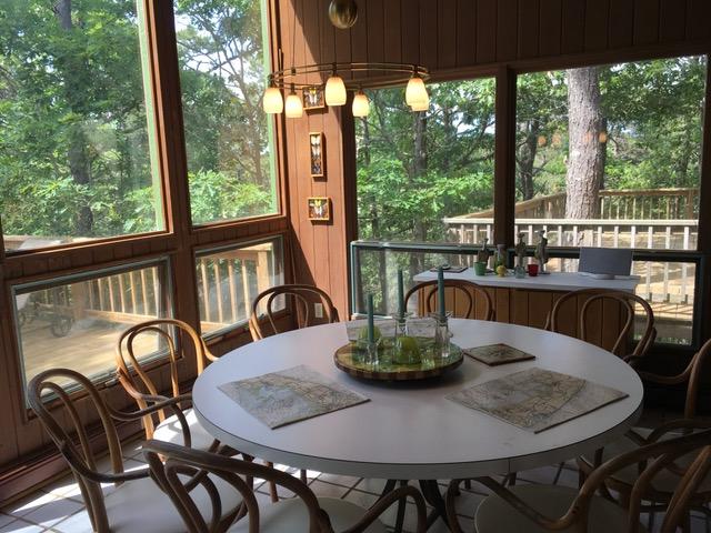 1080 Browns Neck Road Wellfleet, MA 02667 - Photo 10 of 35 a view of a dining room with furniture window and outside view