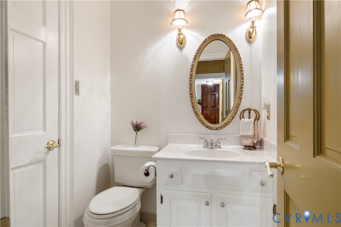 6701 Greenyard Road Chester, VA 23831 - Photo 15 of 49 a bathroom with a sink and a mirror