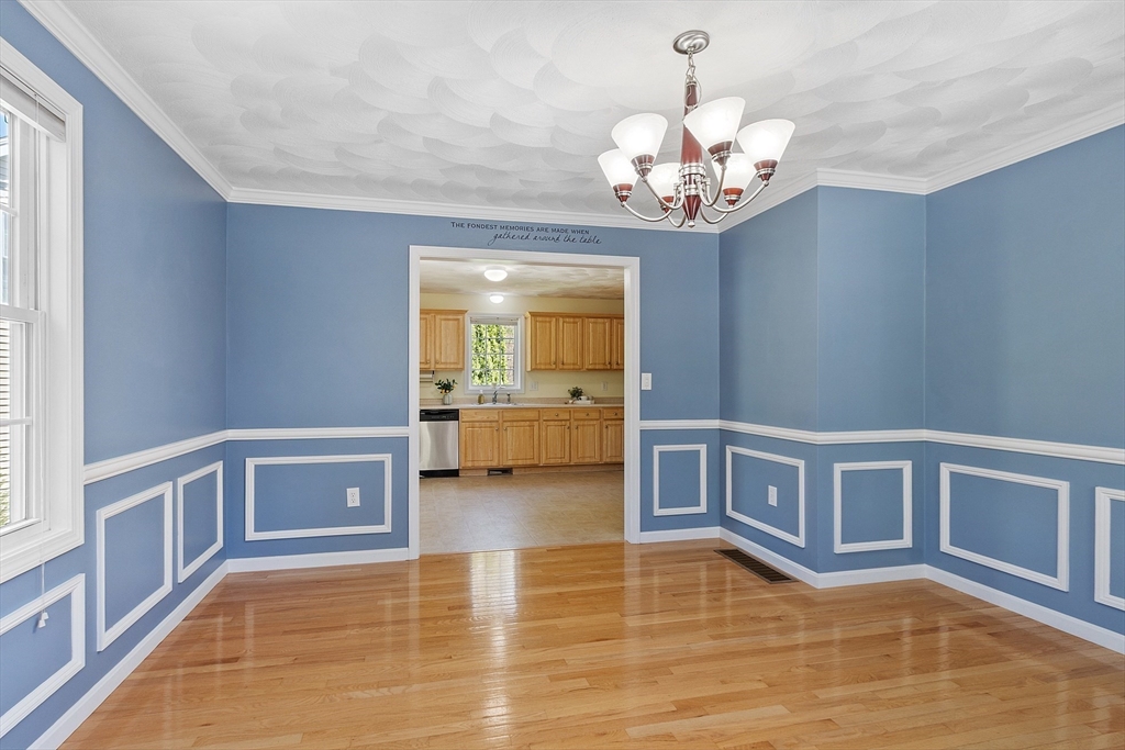 107 Charant Road Lowell, MA 01854 - Photo 10 of 30 a view of an empty room and window