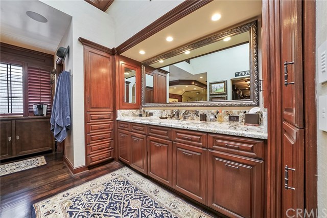 3 Harbor Island Newport Beach, CA 92660 - Photo 39 of 73 The master suite bathroom offers extensive storage and a television in the mirror so you don't miss a moment of the morning news.