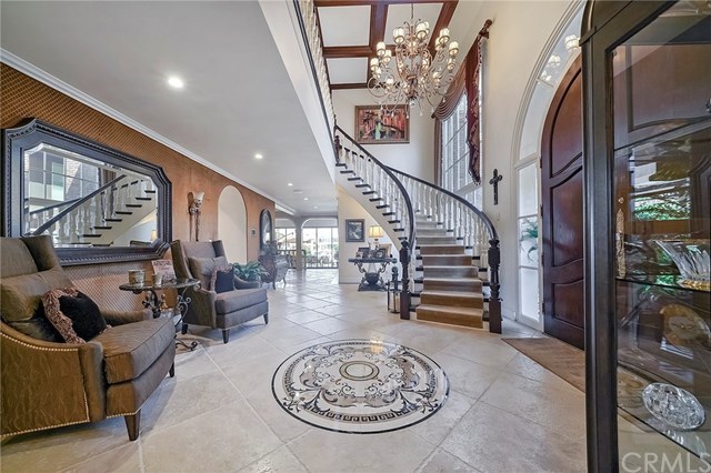 3 Harbor Island Newport Beach, CA 92660 - Photo 5 of 73 A magnificent foyer is the perfect place to greet guests, with a dramatic spiral staircase.