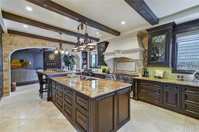 3 Harbor Island Newport Beach, CA 92660 - Photo 6 of 73 A new kitchen was installed certain to please the family chef with multiple refrigeration drawers, warming drawer, six burner cooktop with grill, microwave, vegetable sink and extensive prep areas on the island and counters.
