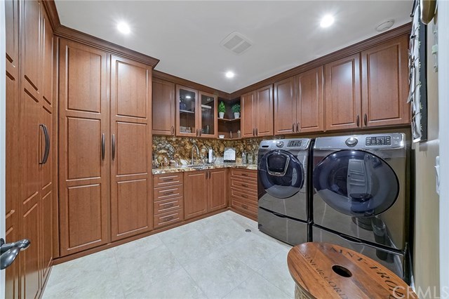 3 Harbor Island Newport Beach, CA 92660 - Photo 57 of 73 Remodeled laundry room is located on the subterranean level.