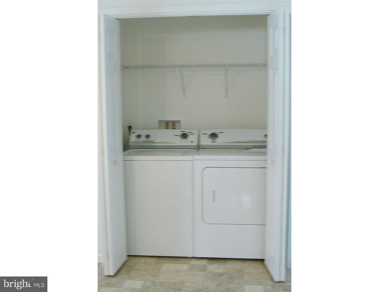 226 Pine Street Dover, DE 19901 - Photo 12 of 20 a utility room with a sink and cabinets